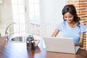 Young woman using laptop