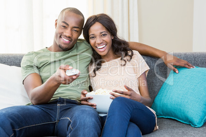 Young couple relaxing on the sofa