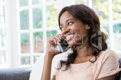 Young woman talking on a mobile phone