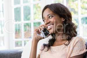 Young woman talking on a mobile phone