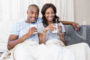 Young couple relaxing on the sofa