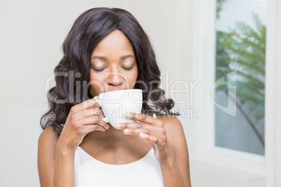 Young woman drinking coffee