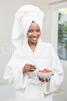 Young woman having breakfast