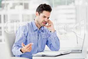 Businessman talking on mobile phone