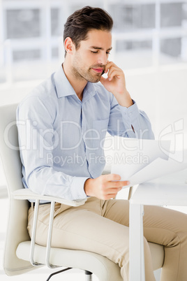 Businessman talking on mobile phone