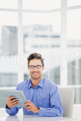 Businessman holding a digital tablet