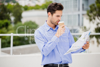 Businessman reading a newspaper