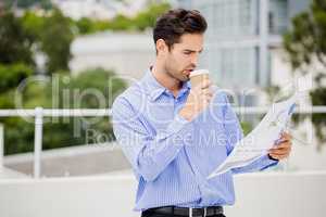 Businessman reading a newspaper