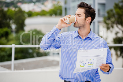 Businessman reading a newspaper