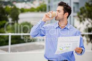 Businessman reading a newspaper