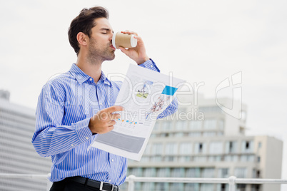 Businessman reading a newspaper