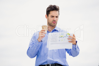 Businessman reading a newspaper