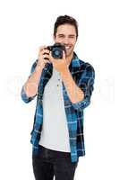 Young man using camera