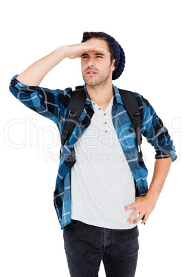 Young man shielding eyes