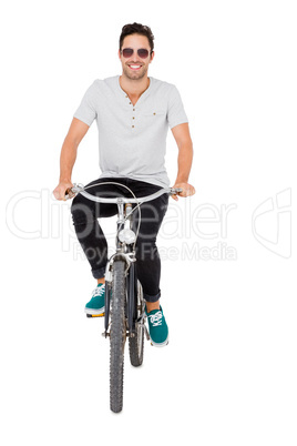 Young man in sunglasses cycling