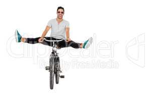 Young man in sunglasses cycling