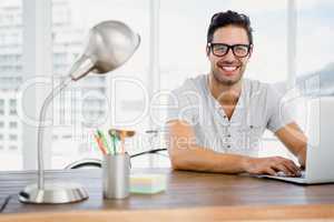 Young man working at his desk