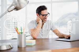 Young man working at his desk