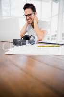 Young man working at his desk