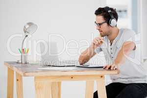 Young man working at his desk