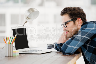 Young man working at his desk