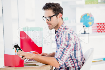 Young man working at his desk