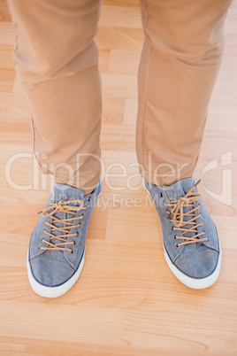 Mans feet with canvas shoes