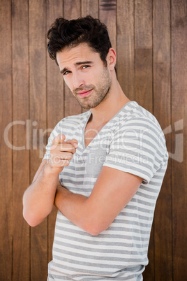 Portrait of handsome man pointing