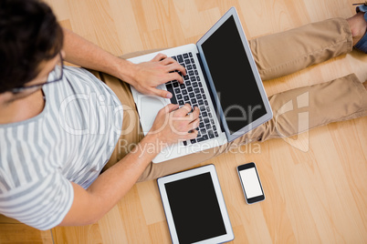 A Man is using a laptop