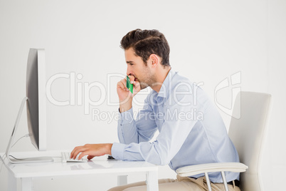 Businessman doing online shopping on computer