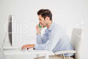 Businessman doing online shopping on computer