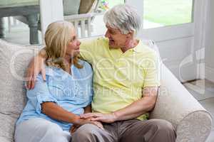 High angle view of senior couple sitting at home