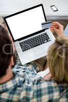 Cropped image of couple shopping online