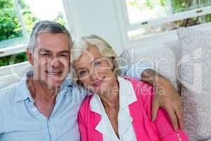 Portrait of senior couple on sofa