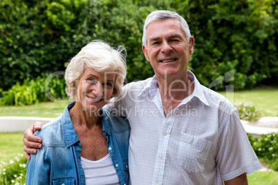 Portrait of senior couple in back yard