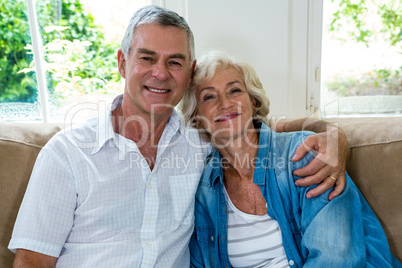 Portrait of senior couple on sofa
