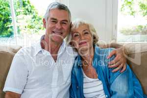 Portrait of senior couple on sofa