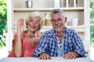 Portrait of senior couple in kitchen at home