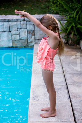 Girl diving into swimming pool