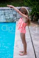 Girl diving into swimming pool