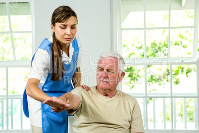 Senior man being examined by nurse