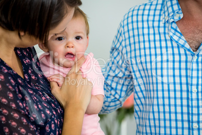 Parents are taking care of their baby