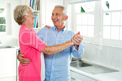 Cheerful senior couple dancing