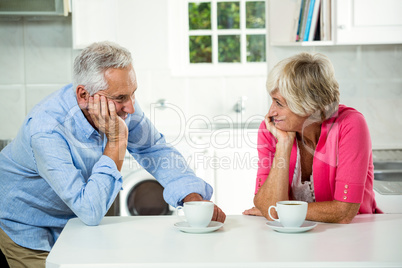 Romantic senior couple with coffee cups