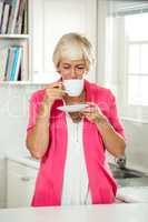 Senior woman drinking coffee