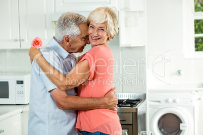 Romantic senior couple with rose