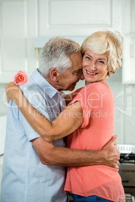 Romantic retired couple with rose