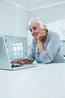 Senior woman with laptop