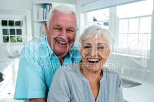 Portrait of confident retired couple