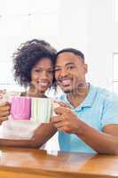 Happy couple toasting coffee mug
